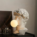 Lampe de table sculpture David à bulle lumineuse